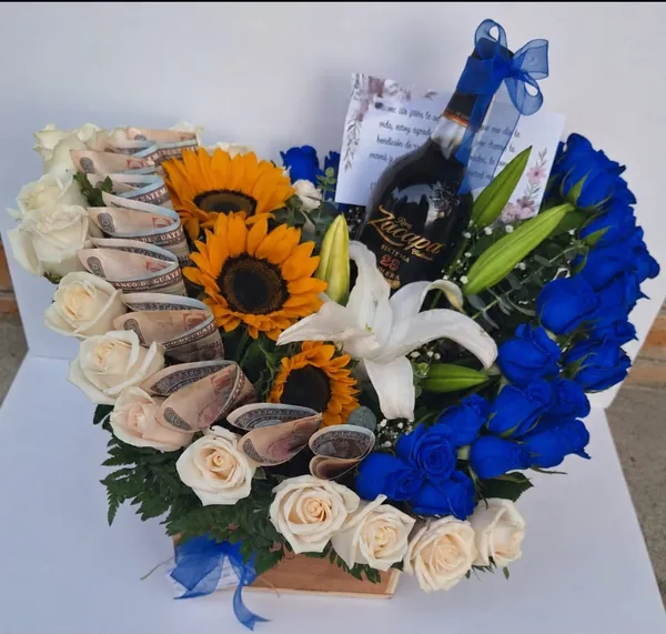 Corazón de rosas y girasoles con detalle de dinero